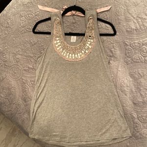 Fancy, sleeveless sexy top, with lots of sprinkle and shine for the holidays.